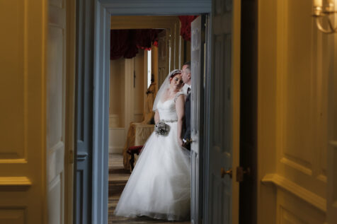 Bride and groom in a historical house