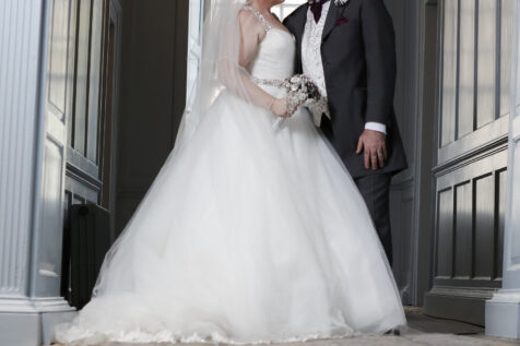 bride and groom in an embrace in a Georgian House
